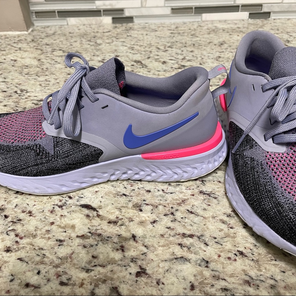 Nike size 10 beautiful blue, pink and grey colors